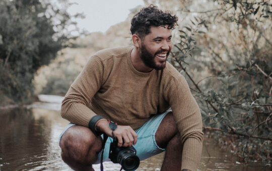 Filipe holding his photographic camera