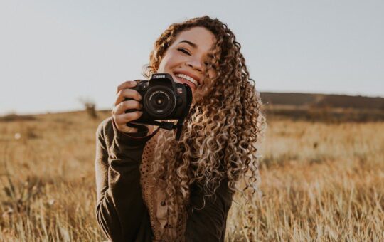 Lorrany holding her photographic camera