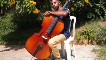 Wesley playing cello at Ramacrisna's garden